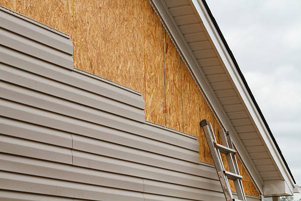 Professional Emergency Siding Repair technician working in New Hyde Park, NY
